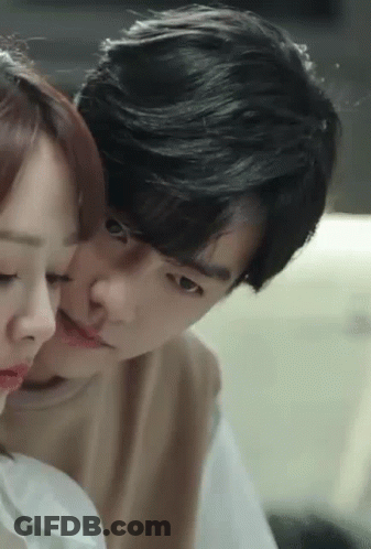 Man And Woman Kissing Close Up GIF