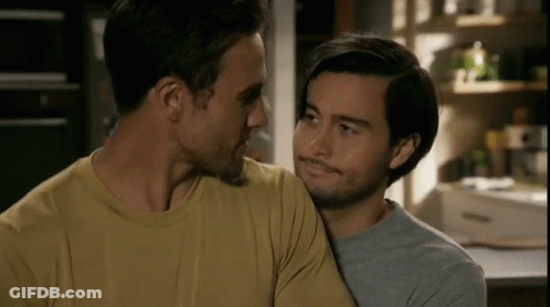 Man And Woman Kissing Close Up GIF