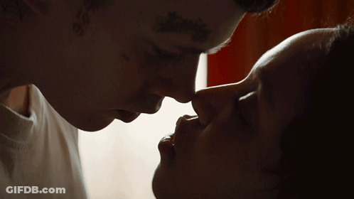 Man And Woman Kissing Close Up GIF