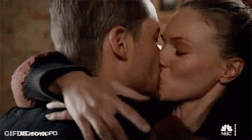 Man And Woman Kissing GIF