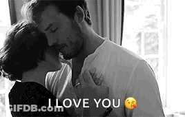 Man And Woman Kissing GIF