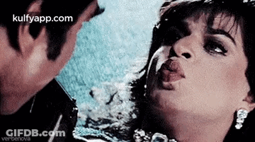Man And Woman Kissing GIF