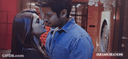 Man And Woman Kissing GIF