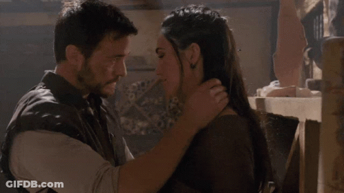 Man And Woman Kissing GIF