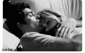 Man And Woman Kissing In Bed Black And White GIF