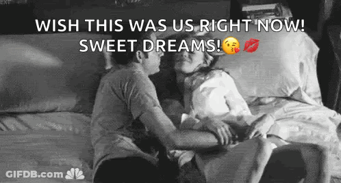 Man And Woman Kissing In Bed GIF