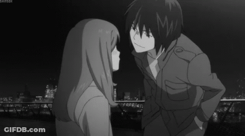 Man And Woman Kissing In Black And White GIF