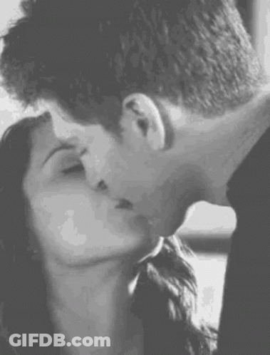 Man And Woman Kissing In Black And White GIF