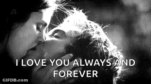 Man And Woman Kissing In Black And White Photo GIF