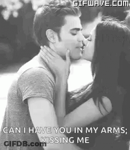 Man And Woman Kissing In Black And White Photo GIF