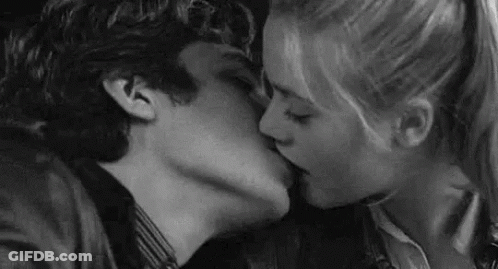 Man And Woman Kissing In Black And White GIF