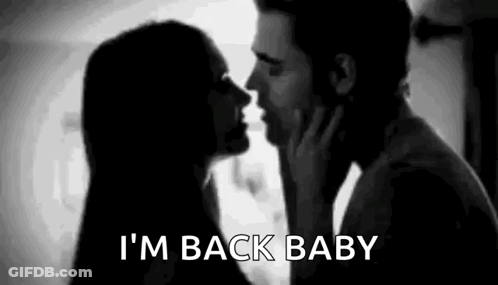 Man And Woman Kissing In Black And White GIF