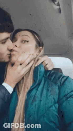 Man And Woman Kissing In Car GIF