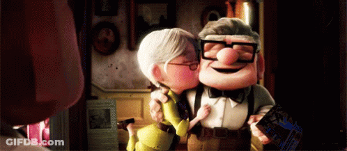 Man And Woman Kissing In Cartoon Room GIF
