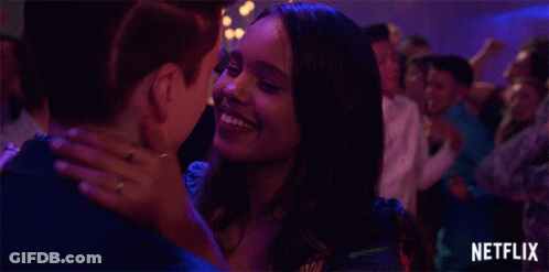 Man And Woman Kissing In Crowd GIF
