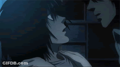 Man And Woman Kissing In Dark GIF