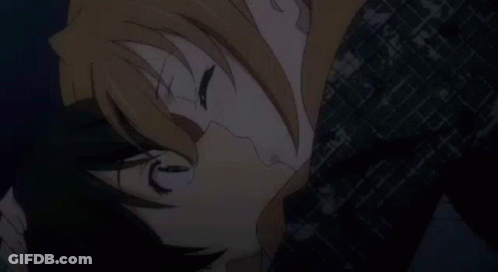 Man And Woman Kissing In Dark Room GIF