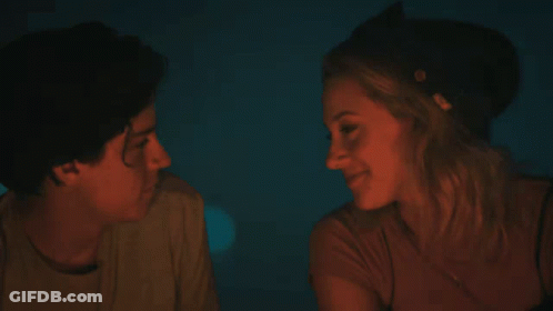 Man And Woman Kissing In Dark Room GIF