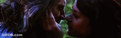 Man And Woman Kissing In Dark Room GIF