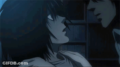 Man And Woman Kissing In Dark Room GIF