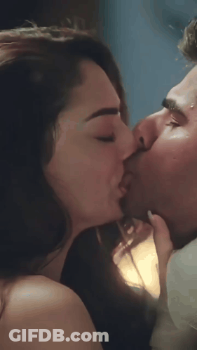 Man And Woman Kissing In Dark Room GIF