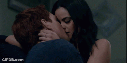 Man And Woman Kissing In Dark Room GIF