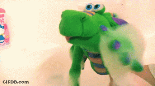 Man And Woman Kissing In Front Of Bazaar Banner GIF