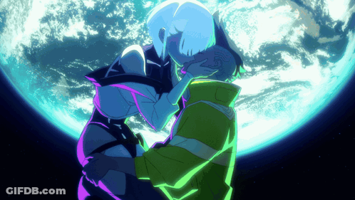 Man And Woman Kissing In Front Of Blue Planet GIF