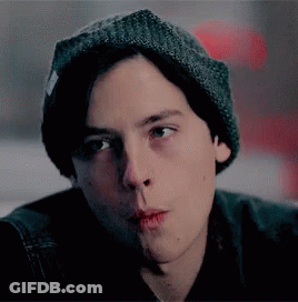 Man And Woman Kissing In Front Of Coca Cola Sign GIF