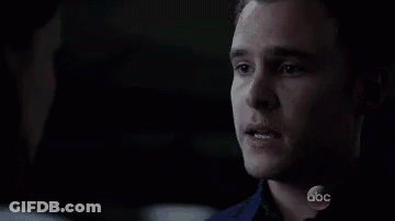 Man And Woman Kissing In Front Of Computer Saying ABC GIF