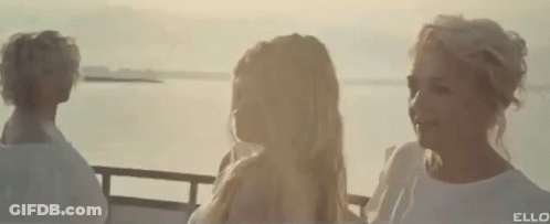 Man And Woman Kissing In Front Of Range Rover GIF