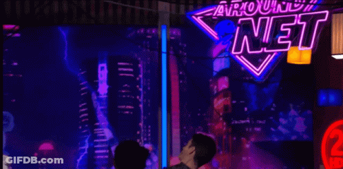 Man And Woman Kissing In Front Of US Army Sign GIF
