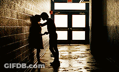 Man And Woman Kissing In Hallway GIF