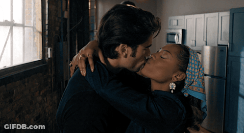 Man And Woman Kissing In Kitchen GIF