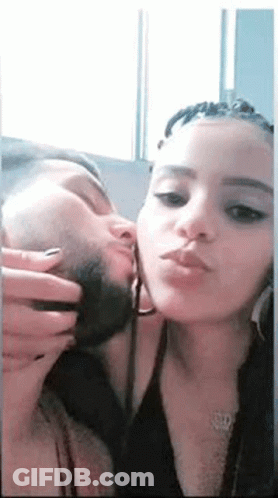 Man And Woman Kissing In Mirror GIF