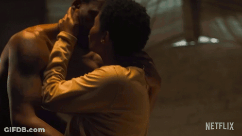 Man And Woman Kissing In Netflix Ad GIF