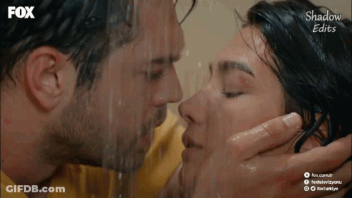 Man And Woman Kissing In Shower GIF