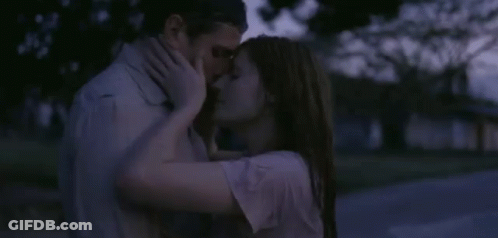 Man And Woman Kissing In The Dark GIF