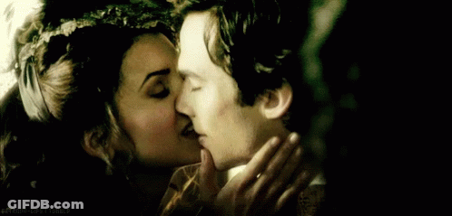 Man And Woman Kissing In The Dark GIF