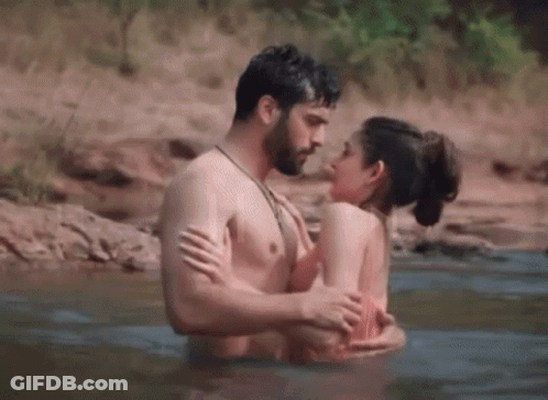 Man And Woman Kissing In Water GIF