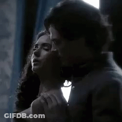 Man And Woman Kissing GIF