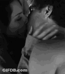 Man And Woman Kissing GIF
