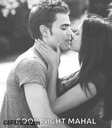 Man And Woman Kissing GIF
