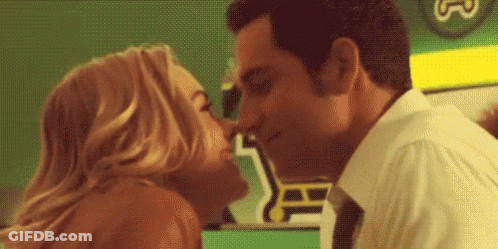 Man And Woman Kissing GIF