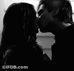Man And Woman Kissing GIF
