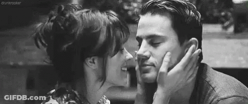 Man And Woman Kissing GIF