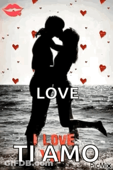 Man And Woman Kissing On Beach GIF