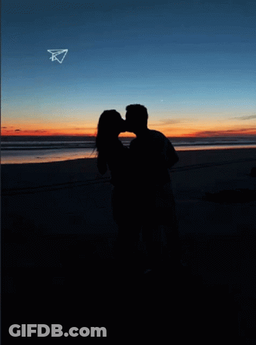 Man And Woman Kissing On Beach 26.03 GIF