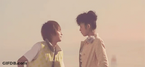Man And Woman Kissing On Beach GIF