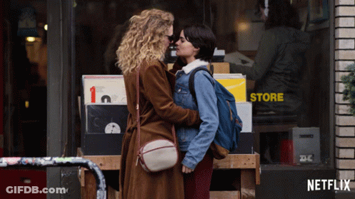 Man And Woman Kissing On Bed GIF